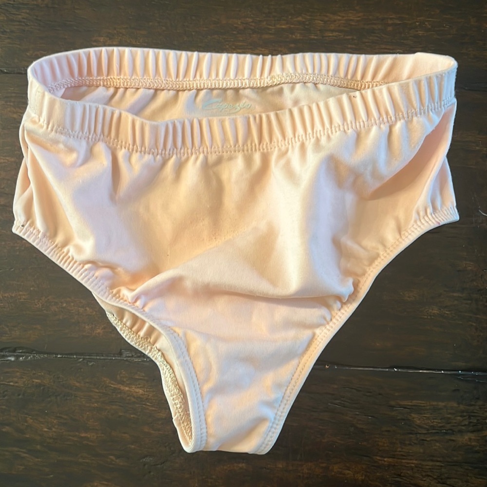 Capezio trunks in european pink color.  CHILDRENS large but fits women.